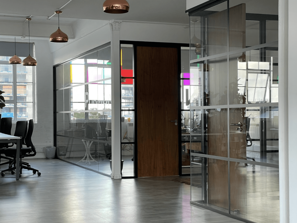 Glass Partitions | Modern office space with framed glass partitions