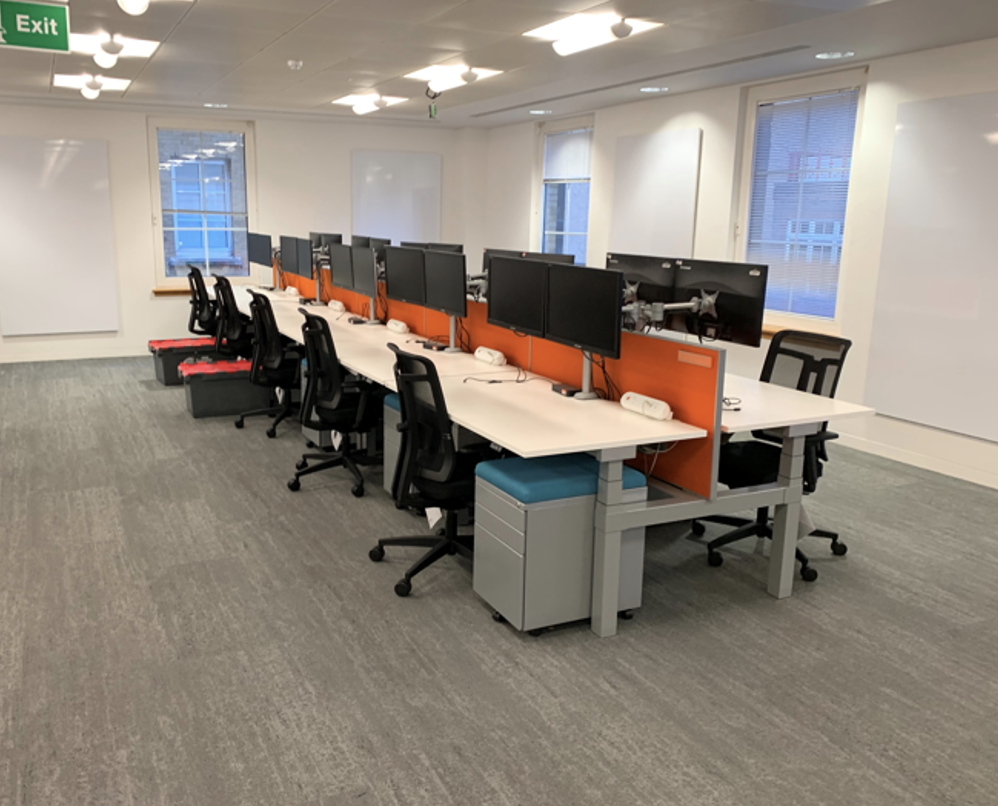 Commercial Office Refurbishment | Meeting room with desks and chairs