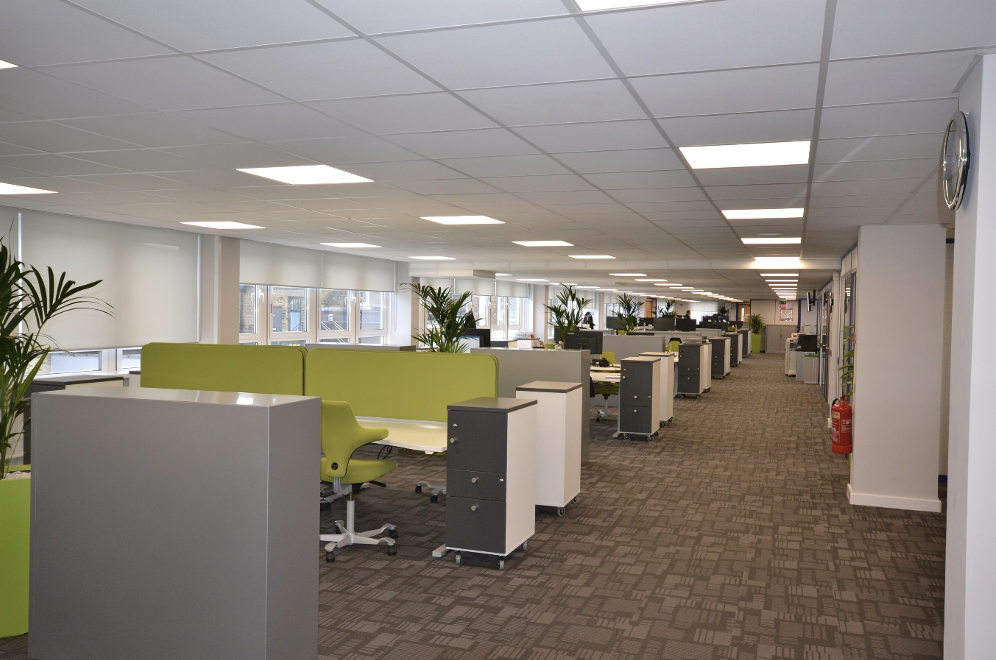 Office refurbishment Sussex | Office space with green partitions and desks