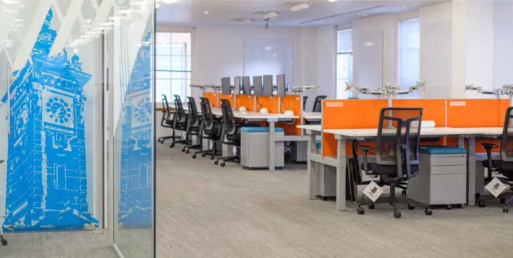 Avalara - Office space with desks and chairs.