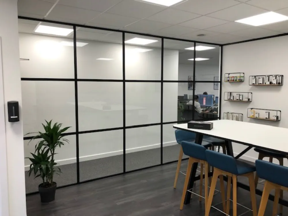 Dermapure | Glazed partitioning in an office space.