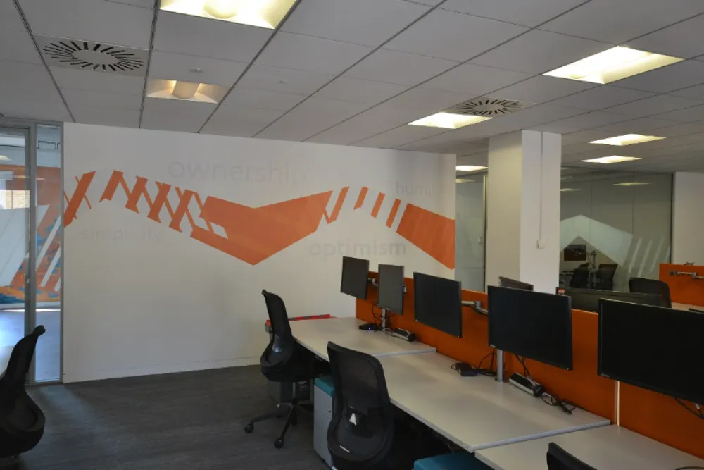 Office interior design | Office space with screens and chairs.