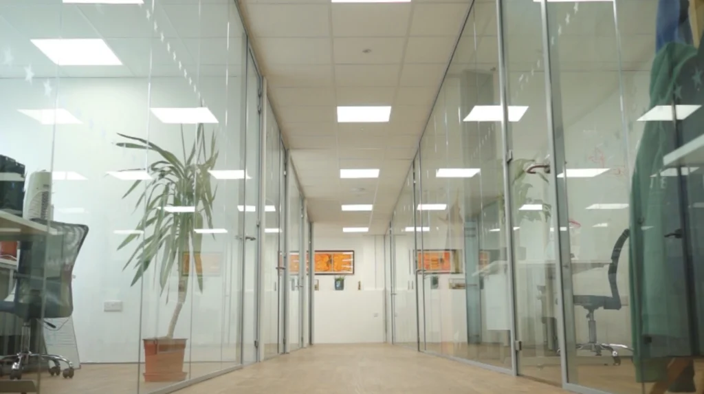 Office refurbishment companies | Glass walls in an office space.