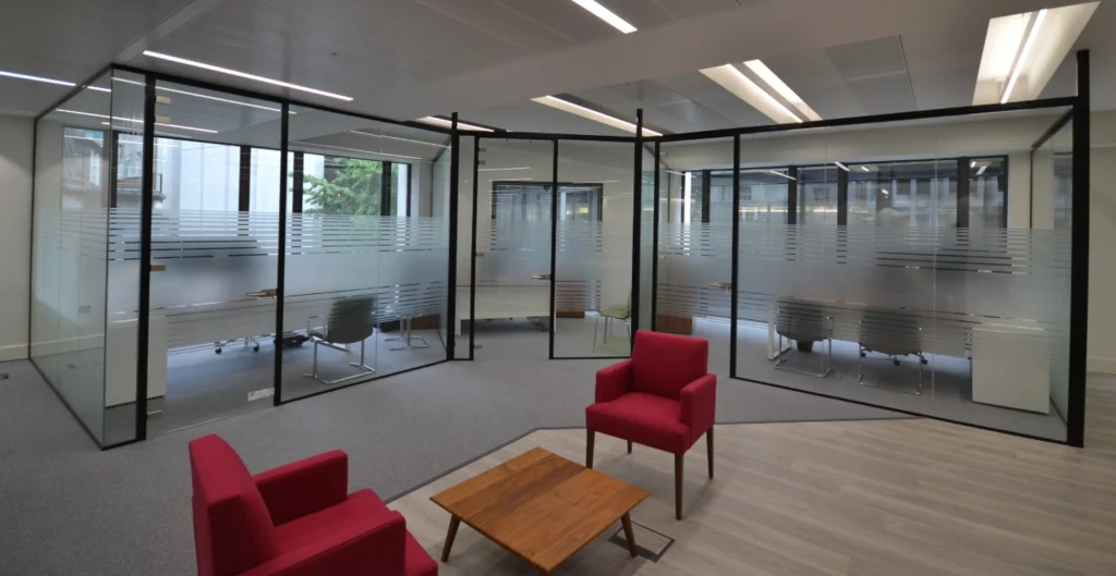 Glass office walls | Office social area with meeting rooms.